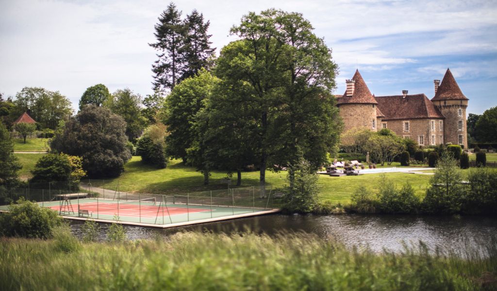 Floating tennis court at Domaine des Étangs, Auberge Resorts Collection in Massignac, France